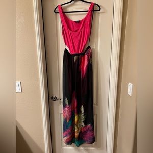 Size M maxi dress, brand bebe. Cut outs on sides and back.
